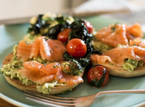 Smoked Salmon Bagel, Crushed Avocado, Tomatoes, Spinach and Scrambled Egg
